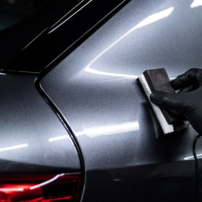 applying ceramic coat to car