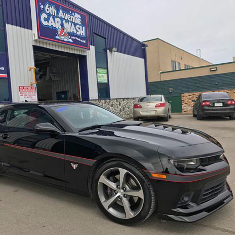sports car parked outside 6th Avenue Car Wash